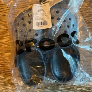 4 pairs of brand new kids size 11 crocs